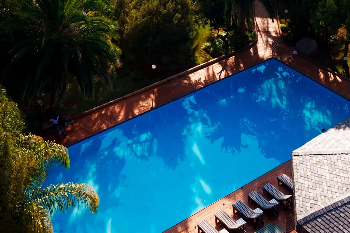 The pool bar under thatch at the end of the pool