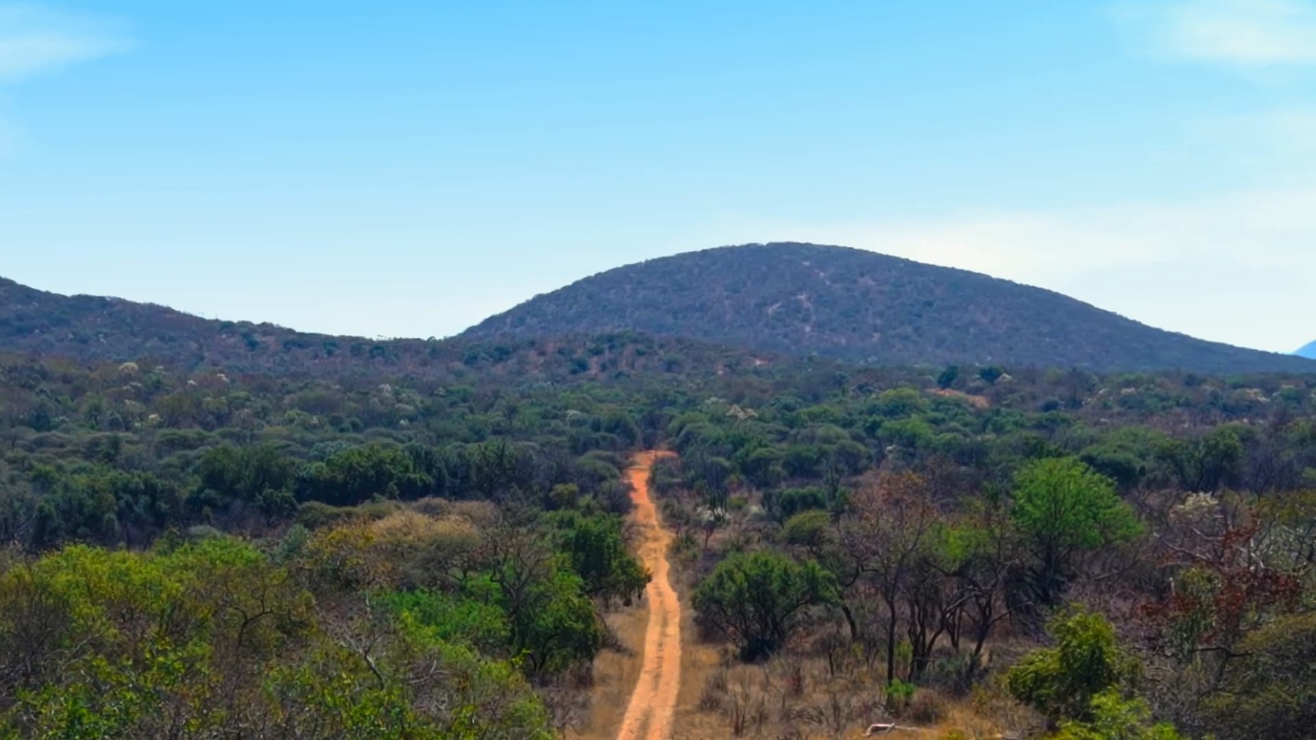 The road in towards the Pilanesberg hills